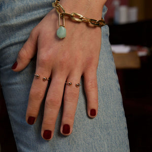 Bague ouverte Sarah en or rose et diamants sertis et diamant baguette